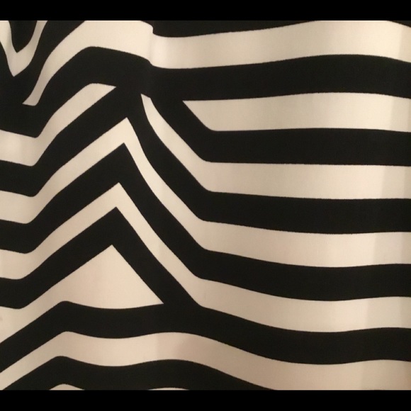 SUPER cute skirt. Has side slit pockets. 20” long. - Picture 3 of 3